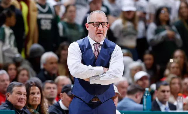 Maryland coach Buzz Williams watches during the first half of an NCAA college basketball game, Saturday, Jan. 24, 2026, in East Lansing, Mich. (AP Photo/Al Goldis)
