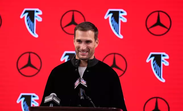 Atlanta Falcons quarterback Kirk Cousins talks to reporters after an NFL football game against the Los Angeles Rams, Monday, Dec. 29, 2025, in Atlanta. (AP Photo/Mike Stewart)