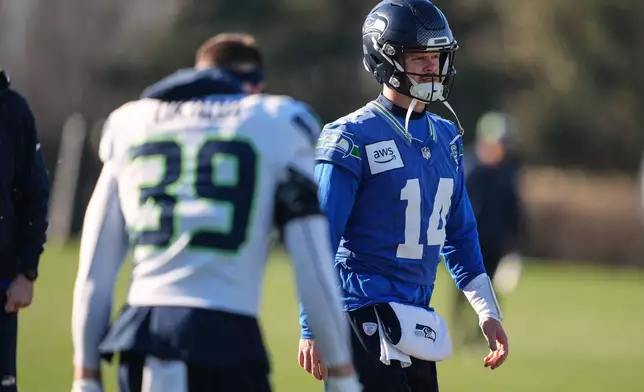 Seattle Seahawks quarterback Sam Darnold walks on the field during practice at the team's facilities ahead of the NFL football NFC Championship game, Wednesday, Jan. 21, 2026, in Renton, Wash. (AP Photo/Lindsey Wasson)