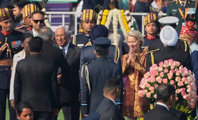 European Council President Antonio Costa, center left, and European Commission President Ursula von der Leyen greet officials upon their arrival at the Republic Day parade in New Delhi, India, Monday, Jan. 26, 2026. (AP Photo/Manish Swarup)