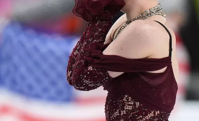 Amber Glenn reacts after competing during the women's short program at the U.S. Figure Skating Championships, Wednesday, Jan. 7, 2026, in St. Louis. (AP Photo/Stephanie Scarbrough)