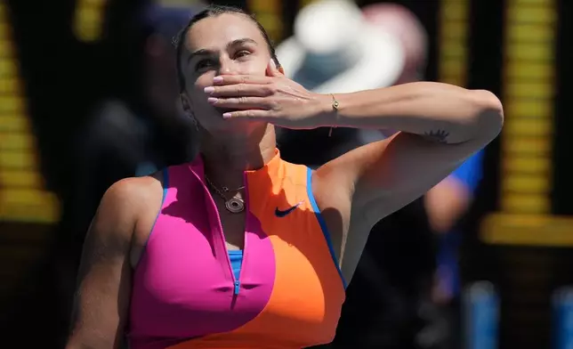 Aryna Sabalenka of Belarus celebrates after defeating Victoria Mboko of Canada in their fourth round match at the Australian Open tennis championship in Melbourne, Australia, Sunday, Jan. 25, 2026. (AP Photo/Dita Alangkara)