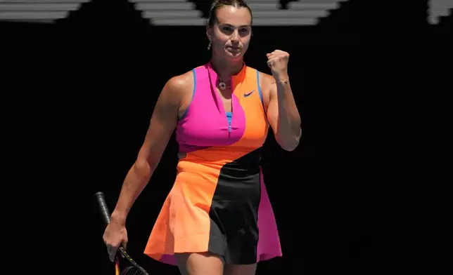Aryna Sabalenka of Belarus reacts after defeating Victoria Mboko of Canada in their fourth round match at the Australian Open tennis championship in Melbourne, Australia, Sunday, Jan. 25, 2026. (AP Photo/Dita Alangkara)