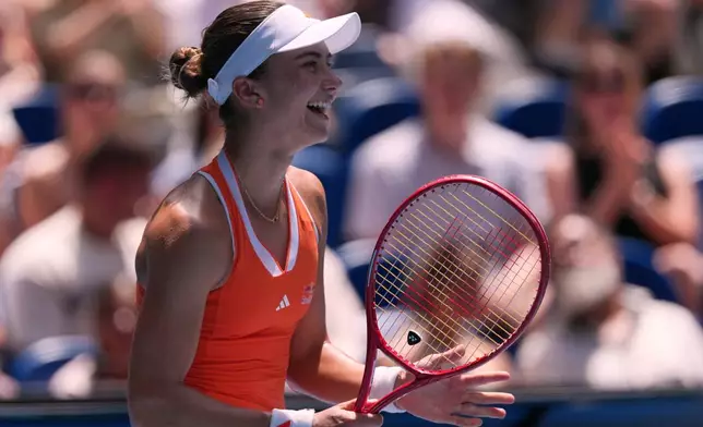 Iva Jovic of the U.S. celebrates after defeating Yulia Putintseva of Kazakhstan in their fourth round match at the Australian Open tennis championship in Melbourne, Australia, Sunday, Jan. 25, 2026. (AP Photo/Aaron Favila)