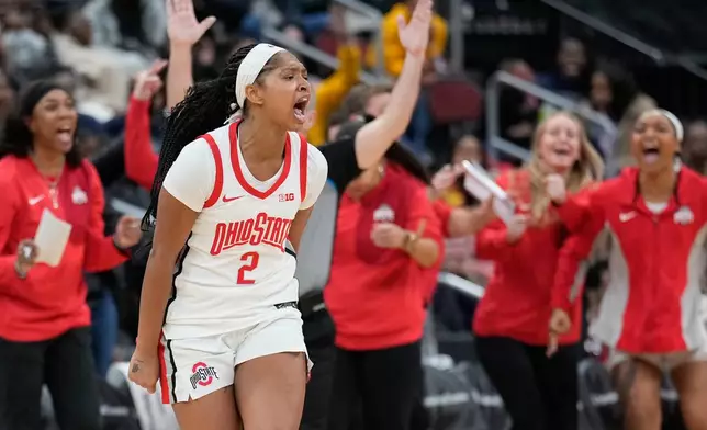 Ohio State's Chance Gray reacts after sinking a basket during the second half of an NCAA women's college basketball game against TCU in Newark, N.J., Monday, Jan. 19, 2026. (AP Photo/Seth Wenig)