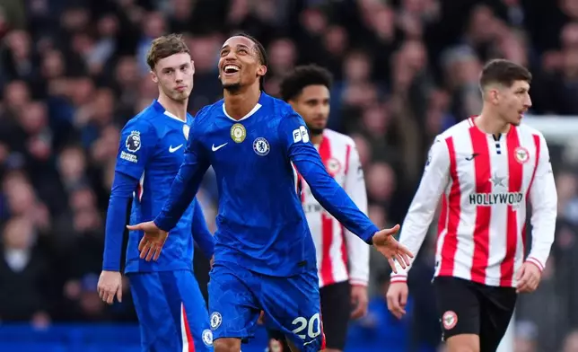 Chelsea's Joao Pedro celebrates scoring during the English Premier League soccer match between Chelsea and Brentford in London, Saturday Jan. 17, 2026. (Bradley Collyer/PA via AP)