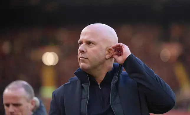 Liverpool's manager Arne Slot enters to the pitch prior to the English Premier League soccer match between Liverpool and Burnley in Liverpool, England, Saturday, Jan. 17, 2026. (AP Photo/Jon Super)