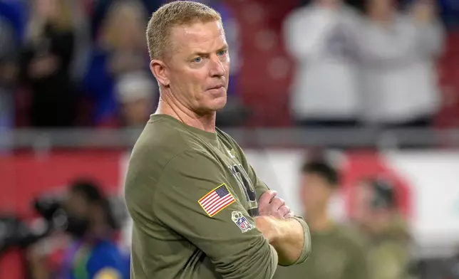FILE - New York Giants offensive coordinator Jason Garrett watches players warm up before an NFL football game against the Tampa Bay Buccaneers, Monday, Nov. 22, 2021, in Tampa, Fla. (AP Photo/Phelan M. Ebenhack)