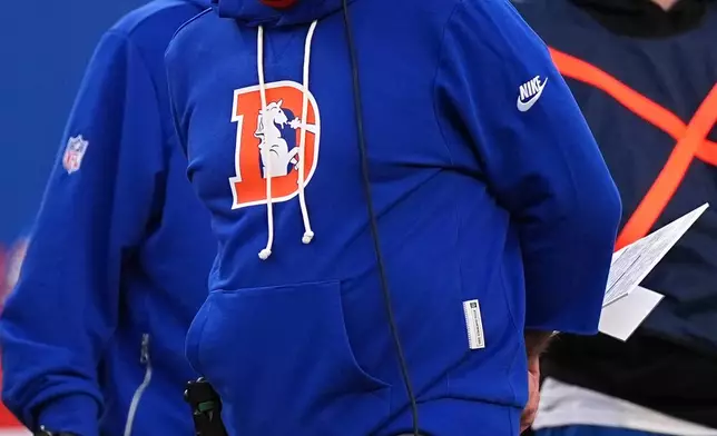 Denver Broncos head coach Sean Payton looks on during the second half of an NFL football game against the Los Angeles Chargers, Sunday, Jan. 4, 2026, in Denver. (AP Photo/David Zalubowski)