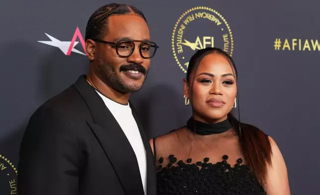 Director Ryan Coogler, left, and his wife Zinzi Evans pose together at the AFI Awards on Friday, Jan. 9, 2026, at the Four Seasons in Los Angeles. (AP Photo/Chris Pizzello)