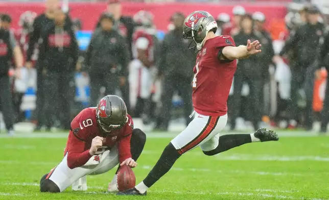 Tampa Bay Buccaneers place kicker Chase McLaughlin (4) makes a field goal during the first half of an NFL football game against the Carolina Panthers Saturday, Jan. 3, 2026, in Tampa, Fla. (AP Photo/Chris O'Meara)