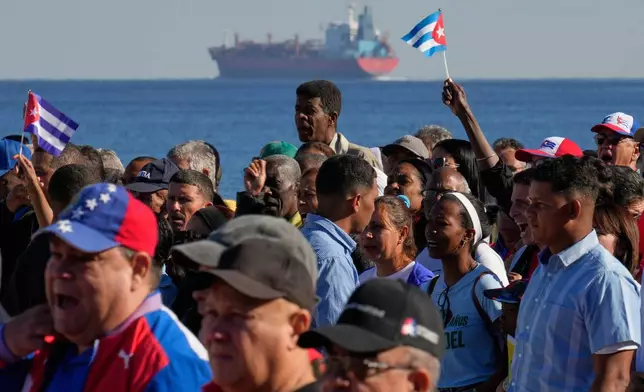 Cubans attend a rally in Havana, Saturday, Jan. 3, 2026, in solidarity with Venezuela after the U.S. captured President Nicolas Maduro and flew him out of Venezuela. (AP Photo/Ramon Espinosa)