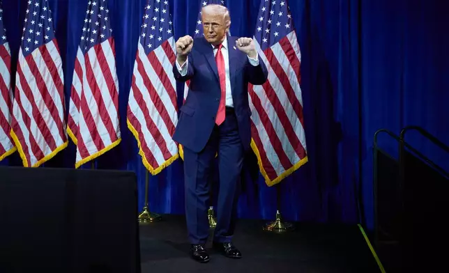 FILE - President Donald Trump dances as he walks off stage after speaking to House Republican lawmakers during their annual policy retreat, Tuesday, Jan. 6, 2026, in Washington. (AP Photo/Evan Vucci, File)