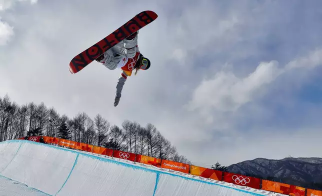 FILE - Chloe Kim, of the United States, runs the course during the women's halfpipe qualifying at Phoenix Snow Park at the 2018 Winter Olympics in Pyeongchang, South Korea, Feb. 12, 2018. (AP Photo/Kin Cheung, File)