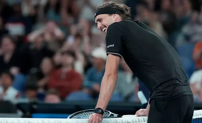 Alexander Zverev of Germany reacts during his second round match against Alexandre Muller of France iat the Australian Open tennis championship in Melbourne, Australia, Wednesday, Jan. 21, 2026. (AP Photo/Aaron Favila)