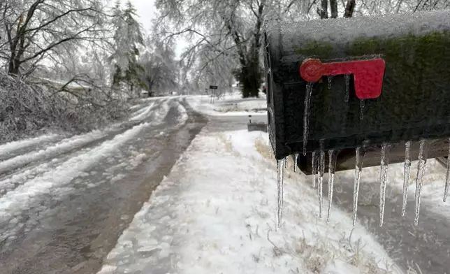 Icicles form on a mailbox on a neighborhood street as a winter storm moves through Nashville, Tenn,, Sunday, Jan,. 25, 2026. (AP Photo/Holly Meyer)