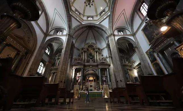 The main altarpiece, designed by artist Manuel Tolsa, stands in La Profesa church in Mexico City, Tuesday, Jan. 27, 2026. (AP Photo/Ginnette Riquelme)