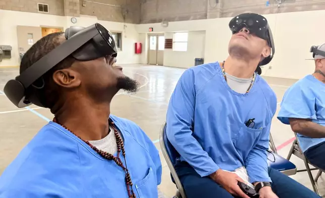 Incarcerated men use virtual reality headsets inside Valley State Prison in Chowchilla, Calif., Dec. 11, 2025. (AP Photo/Haven Daley)