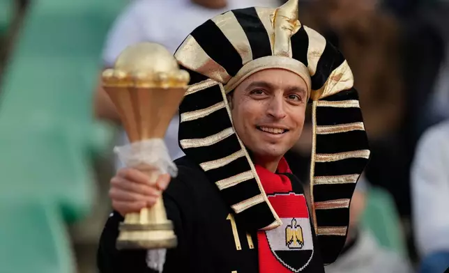 An Egypt supporter at the Africa Cup of Nations group B soccer match between Angola and Egypt in Agadir, Morocco, Monday, Dec. 29, 2025. (AP Photo/Mosa'ab Elshamy)