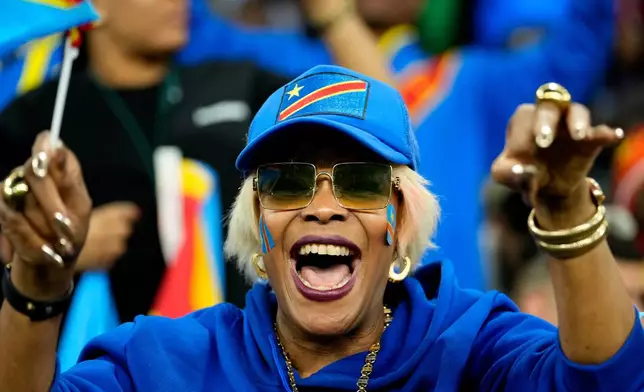 A DR Congo fan cheers prior to the Africa Cup of Nations group D soccer match between Botswana and DR Congo in Rabat, Morocco, Tuesday, Dec. 30, 2025. (AP Photo/Mosa'ab Elshamy)