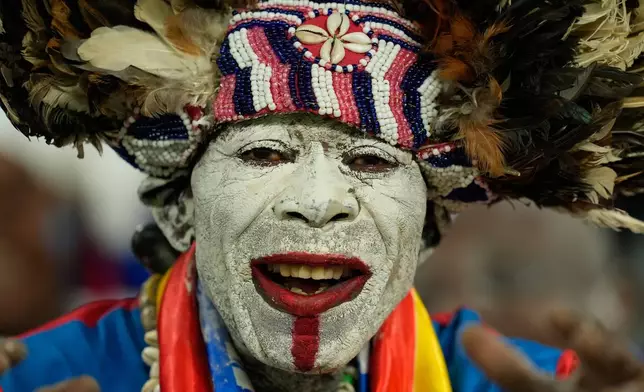 A DR Congo fan cheers prior to the Africa Cup of Nations group D soccer match between Botswana and DR Congo in Rabat, Morocco, Tuesday, Dec. 30, 2025. (AP Photo/Mosa'ab Elshamy)