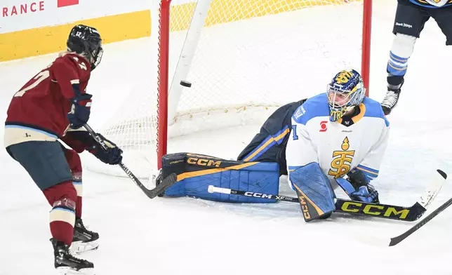 Toronto Sceptres goaltender Raygan Kirk (1) is scored on by Montreal Victoire's Natalie Mlynkova (not shown) as Victoire's Dara Greig (17) looks for a rebound during first period PWHL hockey action in Laval, Que., Wednesday, Jan. 28, 2026. (Graham Hughes/The Canadian Press via AP)