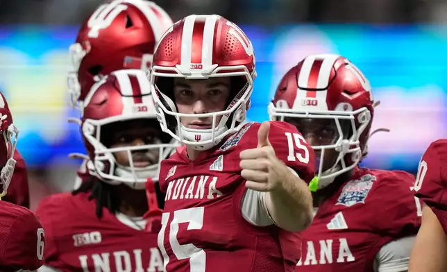 Indiana quarterback Fernando Mendoza (15) reacts during the second half of the Peach Bowl NCAA college football playoff semifinal against Oregon, Friday, Jan. 9, 2026, in Atlanta. (AP Photo/Brynn Anderson)