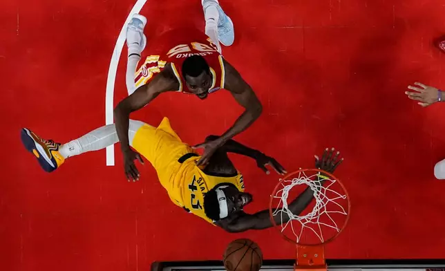 Indiana Pacers forward Pascal Siakam (43) shoots against Atlanta Hawks center Christian Koloko (35) during the second half of an NBA basketball game, Monday, Jan. 26, 2026, in Atlanta. (AP Photo/Mike Stewart)