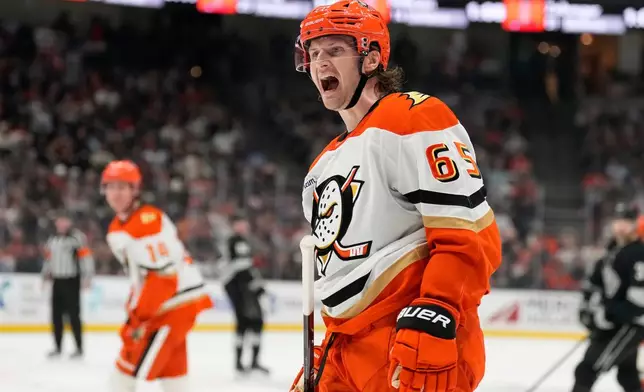 Anaheim Ducks defenseman Jacob Trouba complains to a referee after being called for a slashing penalty during the second period of an NHL hockey game against the Los Angeles Kings, Saturday, Jan. 17, 2026, in Anaheim, Calif. (AP Photo/Mark J. Terrill)