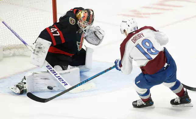 Ottawa Senators' goaltender James Reimer (47) makes a save on Colorado Avalanche's Jack Drury (18) during the second period of an NHL hockey game in Ottawa, Ontario, on Wednesday, Jan. 28, 2026. (Patrick Doyle/The Canadian Press via AP)