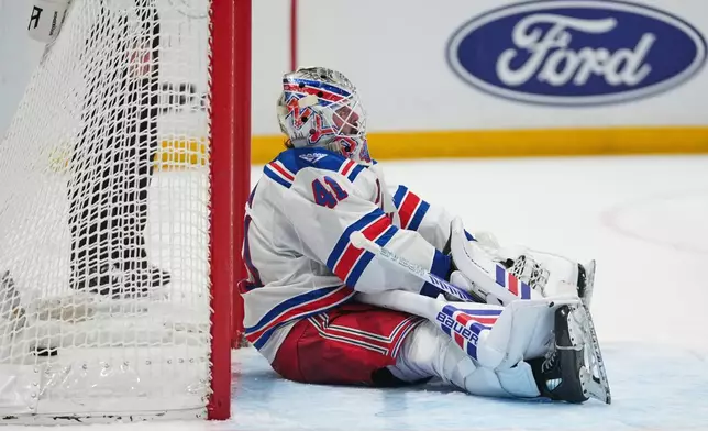 New York Rangers goaltender Spencer Martin (41) reacts after New York Islanders' Mathew Barzal scored a goal during the second period of an NHL hockey game Wednesday, Jan. 28, 2026, in Elmont, N.Y. (AP Photo/Frank Franklin II)