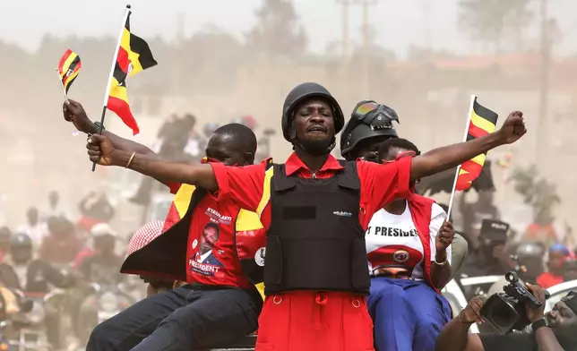 Uganda opposition presidential candidate Robert Kyagulanyi Ssentamu, who is known as Bobi Wine waves to supporters at an election campaign rally in Mukono, Uganda, Friday, Jan. 9, 2026. (AP Photo/Hajarah Nalwadda)