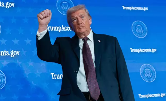 President Donald Trump waves to the crowd after speaking during the launch of a program known as Trump Accounts at Carnegie Mellon Auditorium, Wednesday, Jan. 28, 2026, in Washington. (AP Photo/Jose Luis Magana)