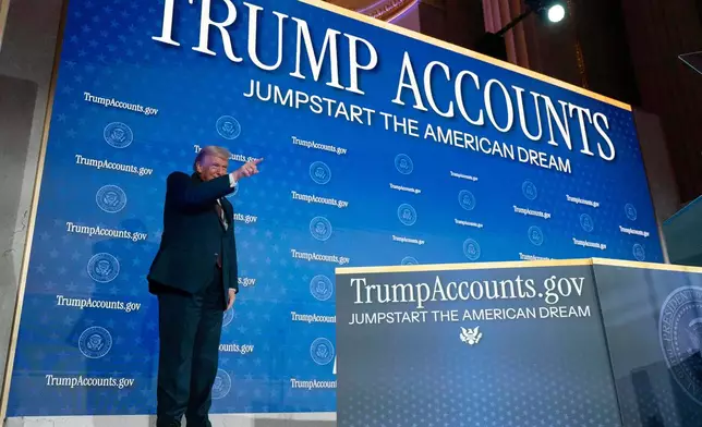 President Donald Trump arrives to the auditorium during the launch of a program known as Trump Accounts at Carnegie Mellon Auditorium, Wednesday, Jan. 28, 2026, in Washington. (AP Photo/Jose Luis Magana)