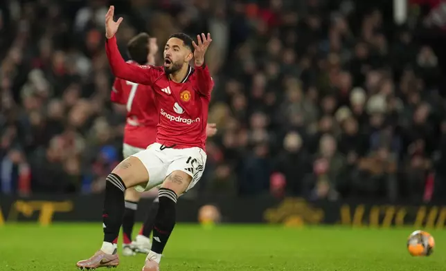 Manchester United's Matheus Cunha reacts during the FA Cup third round soccer match between Manchester United and Brighton in Manchester, England, Sunday, Jan. 11, 2026. (AP Photo/Jon Super)