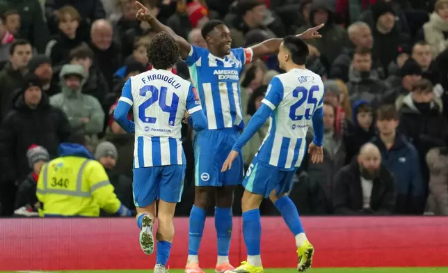 Brighton's Danny Welbeck celebrates after scoring during the FA Cup third round soccer match between Manchester United and Brighton in Manchester, England, Sunday, Jan. 11, 2026. (AP Photo/Jon Super)
