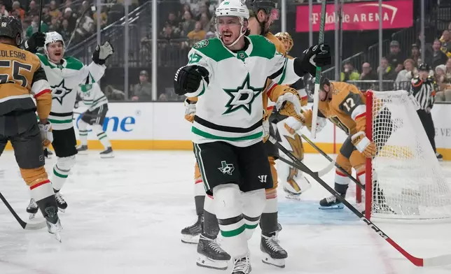 Dallas Stars center Matt Duchene (95) celebrates after scoring against the Vegas Golden Knights during the first period of an NHL hockey game Thursday, Jan. 29, 2026, in Las Vegas. (AP Photo/John Locher)