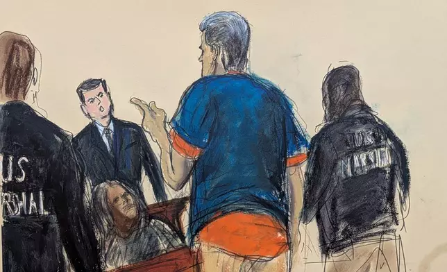 Venezuelan President Nicolas Maduro, center, reacts to a spectator after his arraignment in Manhattan federal court, Monday, Jan. 5, 2026, in New York. (Elizabeth Williams via AP)