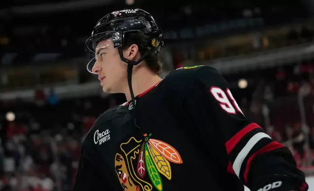 Chicago Blackhawks center Connor Bedard warms up before an NHL hockey game against the Washington Capitals, Friday, Jan. 9, 2026, in Chicago. (AP Photo/Erin Hooley)