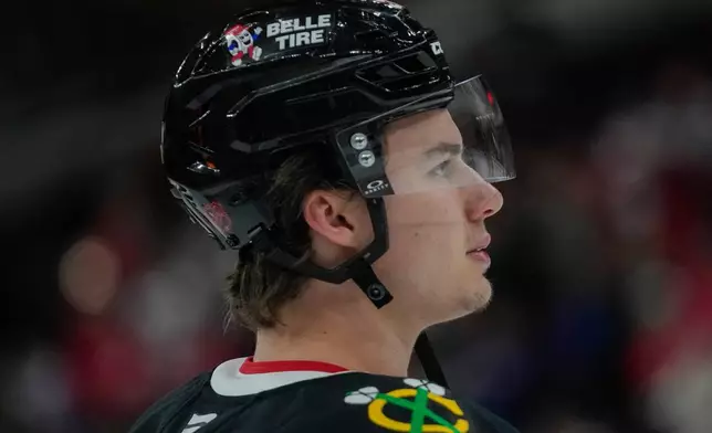 Chicago Blackhawks center Connor Bedard attends warmups before an NHL hockey game against the Washington Capitals, Friday, Jan. 9, 2026, in Chicago. (AP Photo/Erin Hooley)