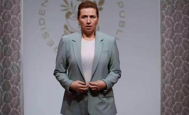 Danish Prime Minister Mette Frederiksen arrives for a meeting of the Coalition of the Willing at the Elysee Palace in Paris, France, Tuesday, Jan.6, 2026. (Yoan Valat, Pool photo via AP)