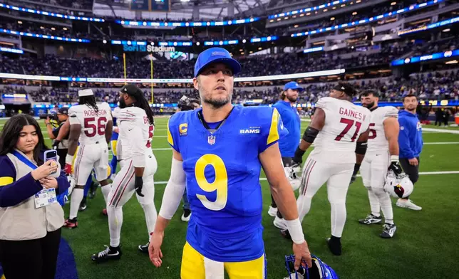 Los Angeles Rams quarterback Matthew Stafford (9) walks off the field after an NFL football game against the Arizona Cardinals, Sunday, Jan. 4, 2026, in Inglewood, Calif. (AP Photo/Mark J. Terrill)