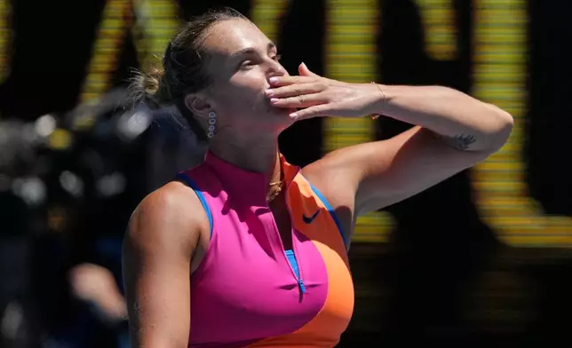 Aryna Sabalenka of Belarus reacts after defeating Anastasia Potapova of Austria in their third round match at the Australian Open tennis championship in Melbourne, Australia, Friday, Jan. 23, 2026. (AP Photo/Asanka Brendon Ratnayake)