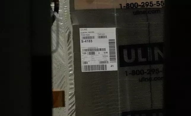 Equipment is loaded into a truck inside the Fulton County Election HUB as the FBI takes Fulton County 2020 Election ballots, Wednesday, Jan. 28, 2026, in Union City, Ga., near Atlanta. (AP Photo/Mike Stewart)