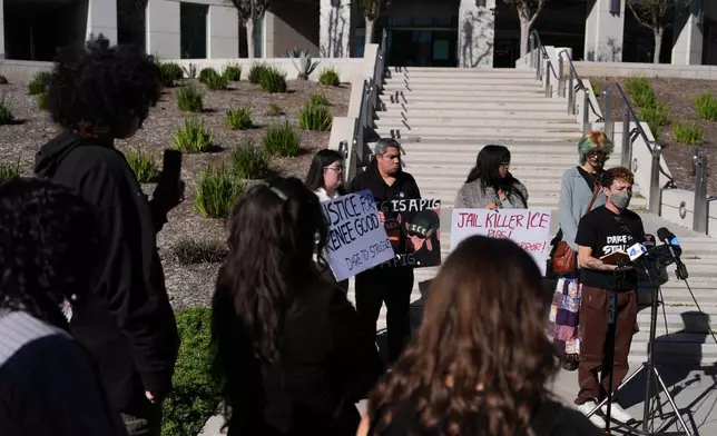Skye Jones, right, with Dare to Struggle, speaks during a news conference outside the Santa Ana Police Department in Santa Ana, Calif., Tuesday, Jan. 13, 2026, following a recent protest outside a federal building in the city. (AP Photo/Jae C. Hong)