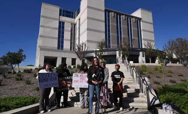 Christina Castillo, center, with Dare to Struggle, speaks during a news conference outside the Santa Ana Police Department in Santa Ana, Calif., Tuesday, Jan. 13, 2026, following a recent protest outside a federal building in the city. (AP Photo/Jae C. Hong)