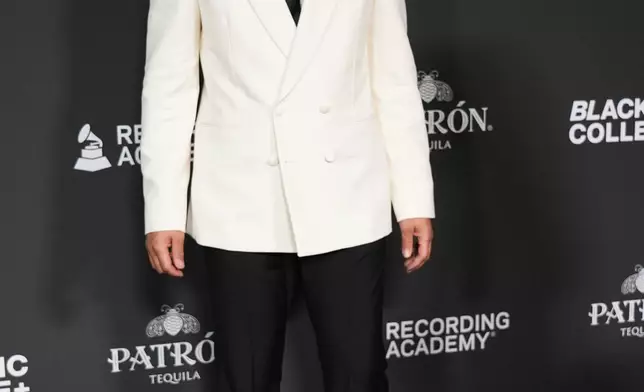 John Legend attends the Recording Academy Honors presented by the Black Music Collective on Thursday, Jan. 29, 2026, in Los Angeles. (Photo by Richard Shotwell/Invision/AP)