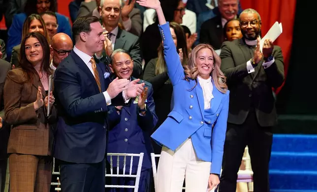 New Jersey Governor-elect Mikie Sherrill waves as she arrives for her inauguration, Tuesday, Jan. 20, 2026, in Newark, N.J. (AP Photo/Seth Wenig)