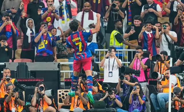 Barcelona's Ferran Torres celebrates after scoring the opening goal during the Spanish Super Cup semifinal soccer match against Athletic Club Bilbao at King Abdullah Sports City Stadium in Jeddah, Saudi Arabia, Wednesday, Jan. 7, 2026. (AP Photo/Altaf Qadri)