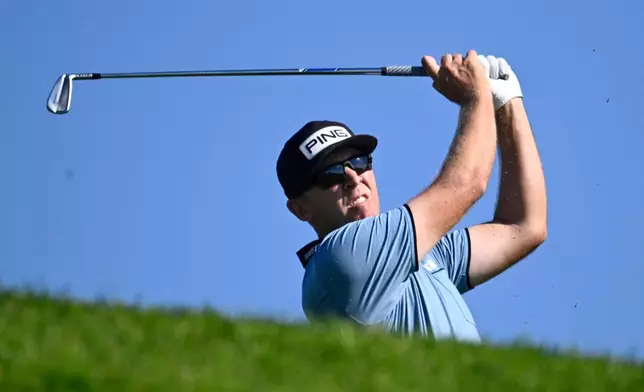 CORRECTS TO SEAMUS POWER, NOT GARY WOODLAND - Seamus Power, of Ireland, tees off on the 15th hole while playing the North Course at Torrey Pines during the second round of the Farmers Insurance Open golf tournament Friday, Jan. 30, 2026, in San Diego. (AP Photo/Denis Poroy)
